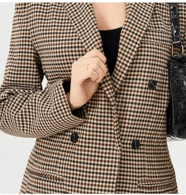 Détail tissu blazer pied-de-poule marron noir et blanc
